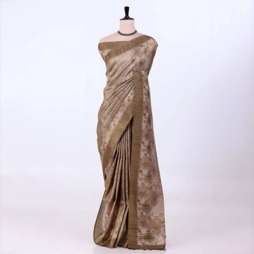 A metallic bronze-brown saree with a floral patterned border