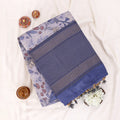 Semi Tussar saree with lavender floral printed body and woven border with decorative pallu.