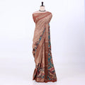 Women's Semi Tussar saree featuring floral print, brown woven border and teal pallu, front display.