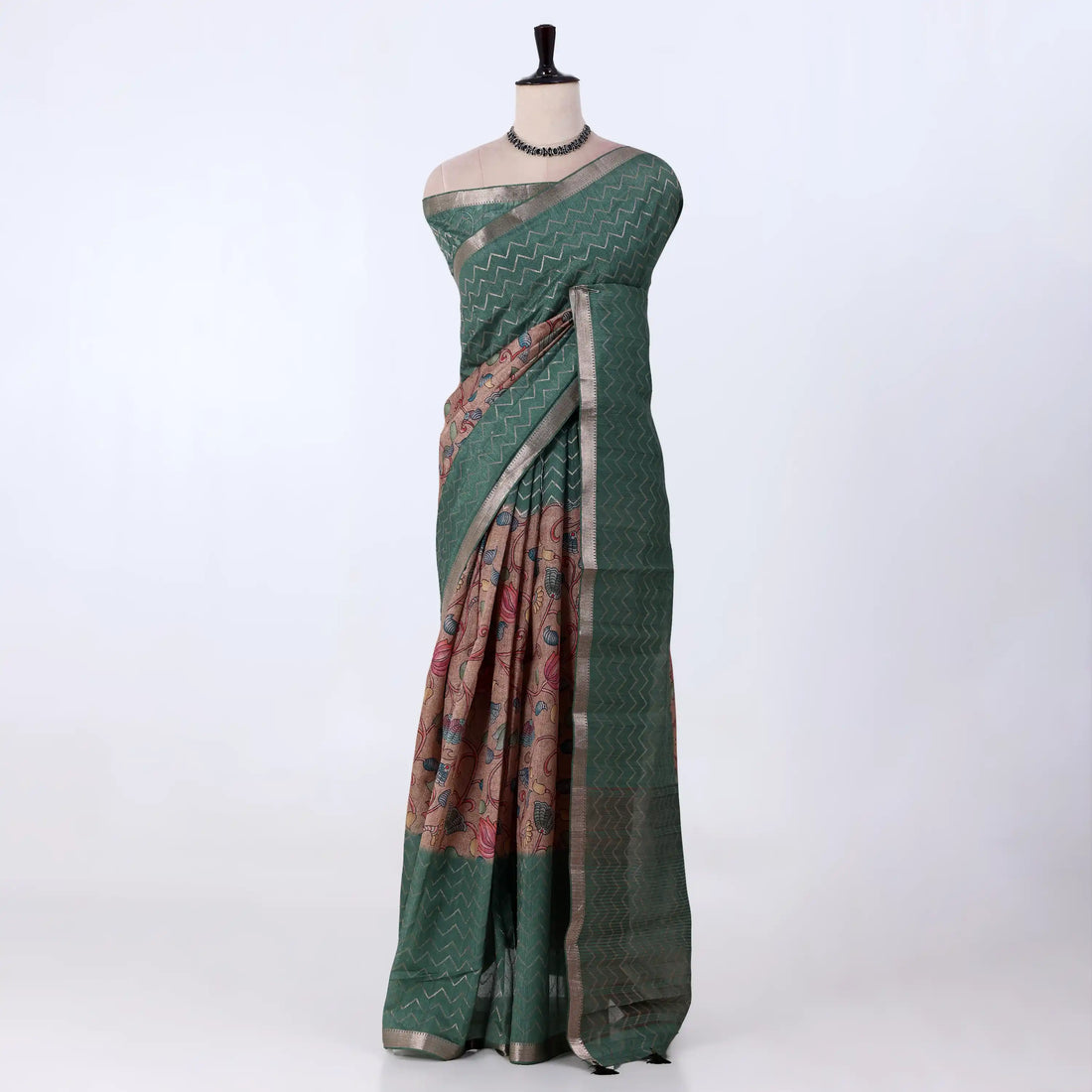 A dark green and black saree with a pink and multicolor printed border