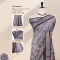 A light gray and navy blue printed saree with inset close-ups of the head, blouse, and pallu sections.