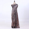 light grey Semi Tussar saree featuring floral print and navy woven border, front drape display.