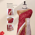 A deep red saree with a beige and gold border and white floral prints