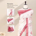 A white saree with pink floral prints and a red-pink border,with detail of head, blouse, and pallu