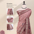 A dusty pink printed saree with a metallic gold border and floral pallu, includes thead, blouse, and pallu