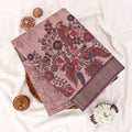 Peach Semi Tussar saree featuring floral print with maroon woven border, elegant folded view
