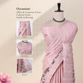 A pink striped saree with butterfly and floral prints with head, blouse, and pallu details.