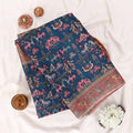 A folded navy blue fabric garment or textile with a colorful printed animal and floral pattern