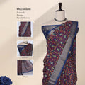 Art silk saree with floral vine jaal weave and silver zari striped border in dark blue front drape view on mannequin