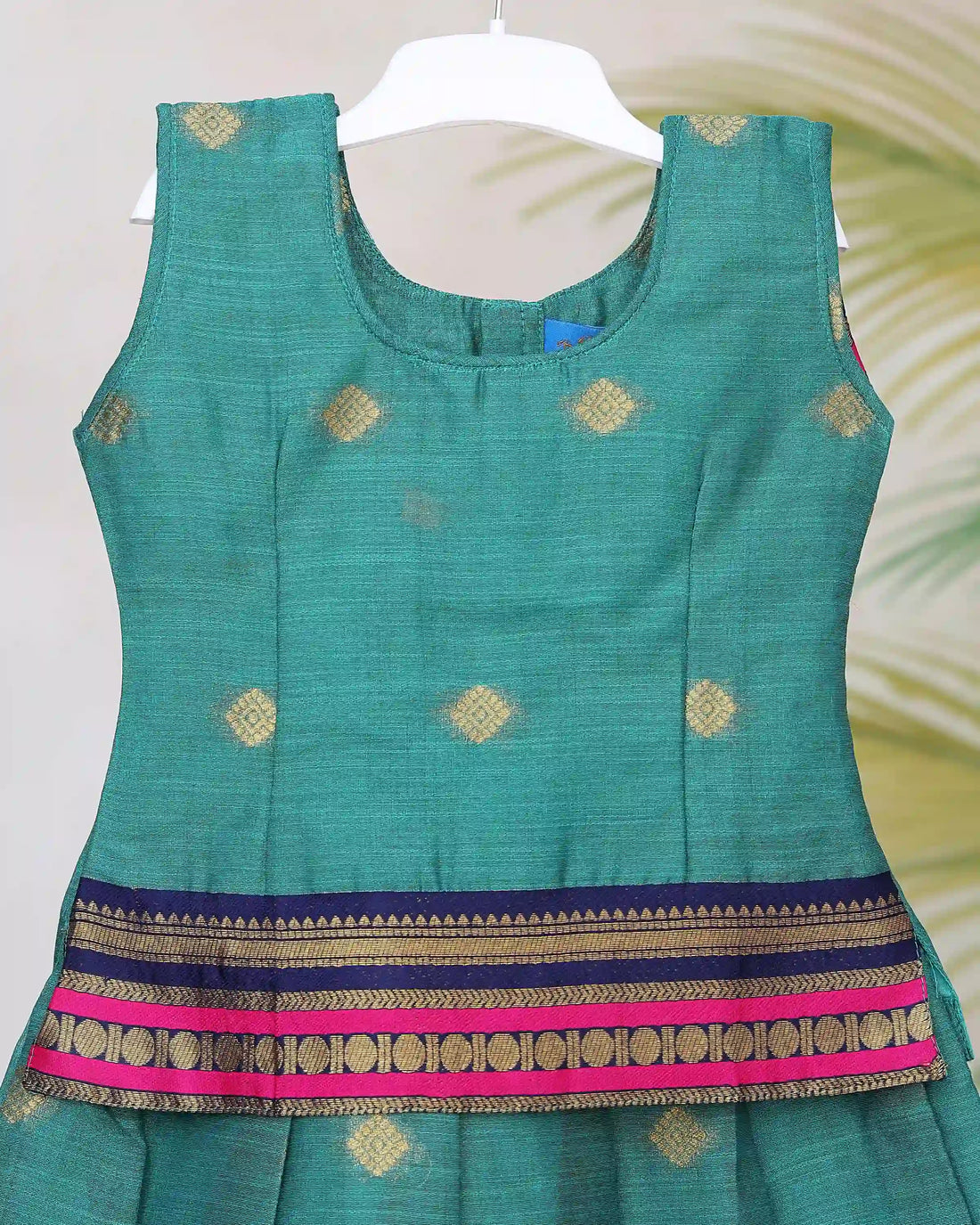 Girls Readymade Pattu Pavadai with Sleeveless Blouse Traditional Zari Woven Border and Gold Motif Detailing - Teal Green