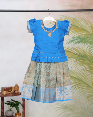 Girls Readymade Pattu Pavadai with Embellished Neckline Puff Sleeves and Floral Design Zari Woven Skirt - Blue