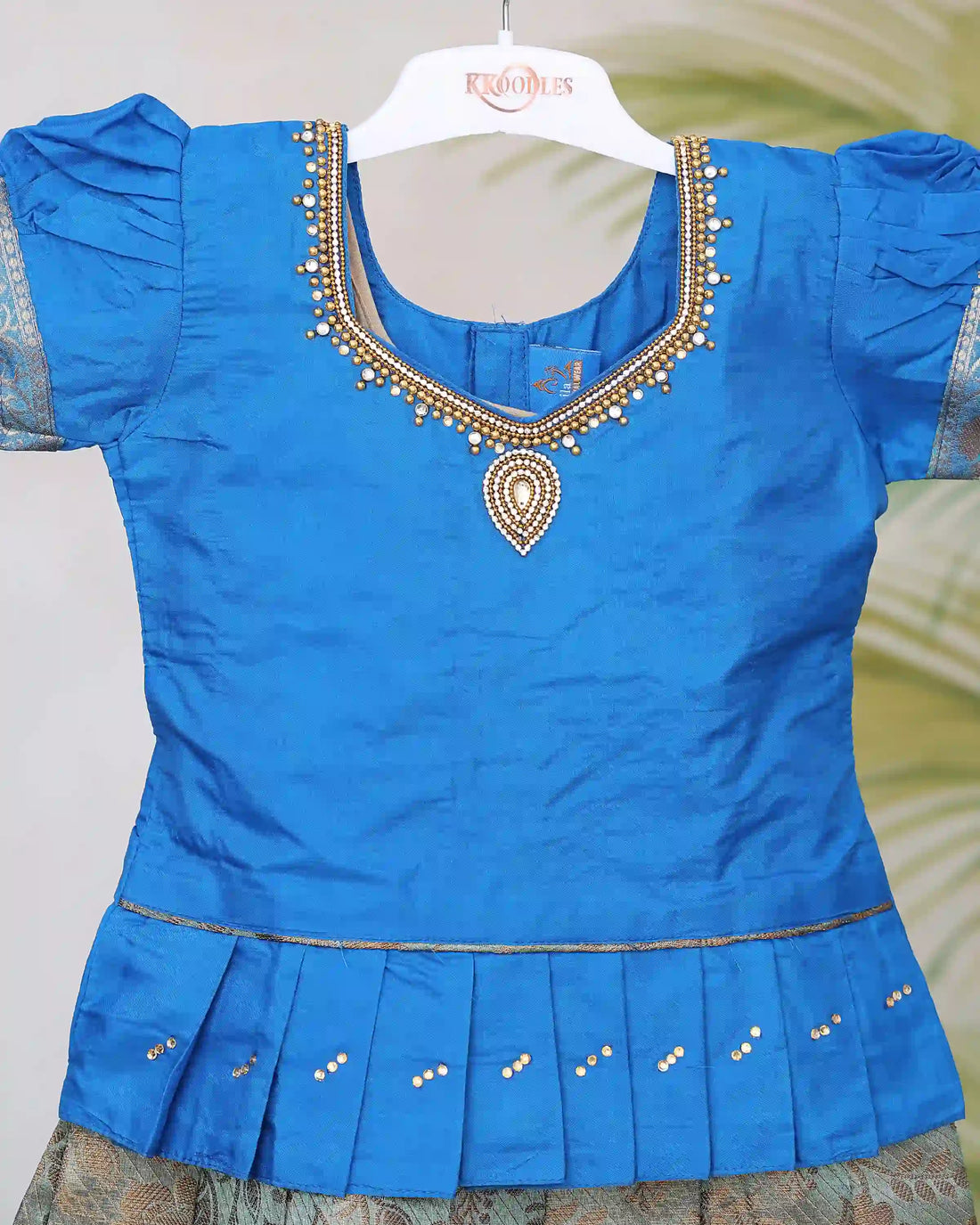 Girls Readymade Pattu Pavadai with Embellished Neckline Puff Sleeves and Floral Design Zari Woven Skirt - Blue