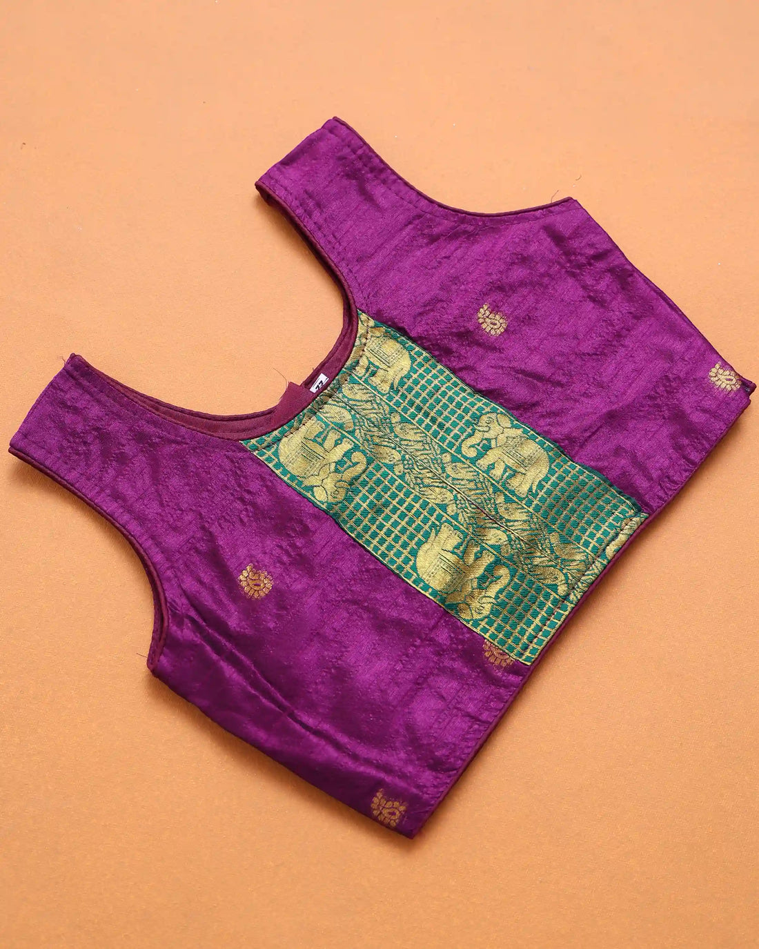Vibrant Purple and Emerald Green Art Silk Pavadai Dhavani Set with Traditional Gold Zari Elephant Motif Woven Border