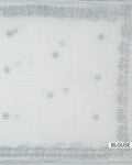 White blouse fabric with subtle woven floral motifs and textured horizontal border detailing full fabric view.
