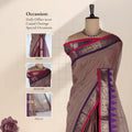 Chettinad cotton saree with plain body broad peacock zari border and contrast temple border front draped view on mannequin.