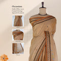 Chettinad cotton saree with beige plain body peacock zari border and butta motifs front draped view on mannequin.