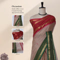 Chettinad cotton saree with temple zari woven border brown body with buttas front draped view on mannequin.