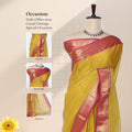 Chettinad cotton saree with yellow body contrast pink zari border and butta motifs front draped view on mannequin.