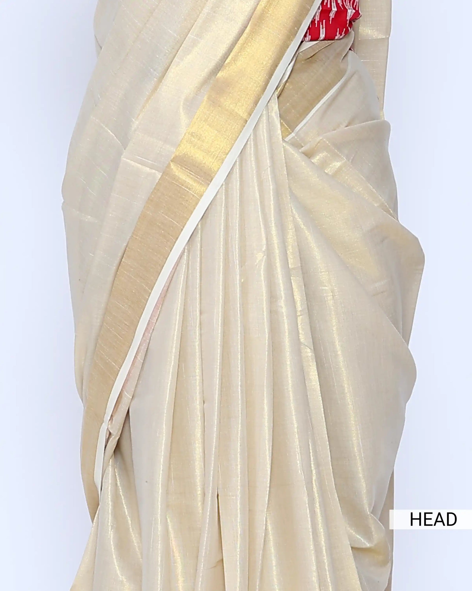 A cream-colored kerala saree with a red and white patterned border and matching blouse - head view