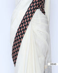 White cotton saree with black printed border and matching printed blouse - head view