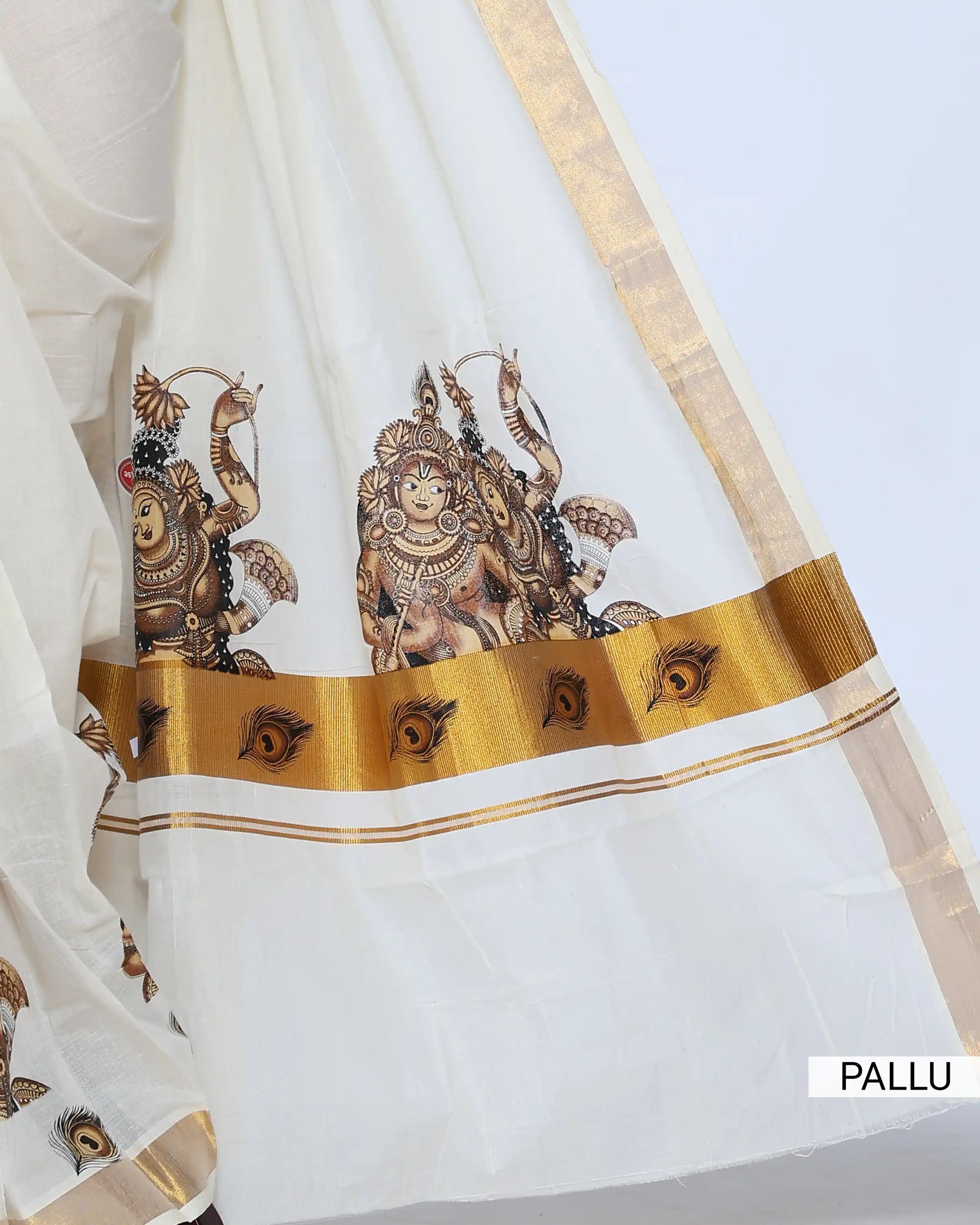 An off-white saree with gold zari borders and brown printed motifs pallu view