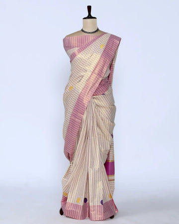 A cream and pink striped kerala saree with a matching pink blouse full view