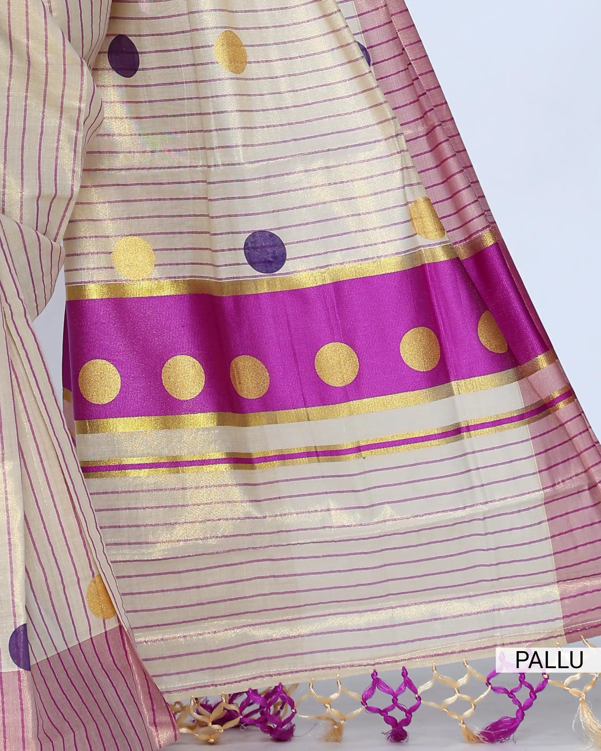 A cream and pink striped kerala saree with a matching pink border  pallu view