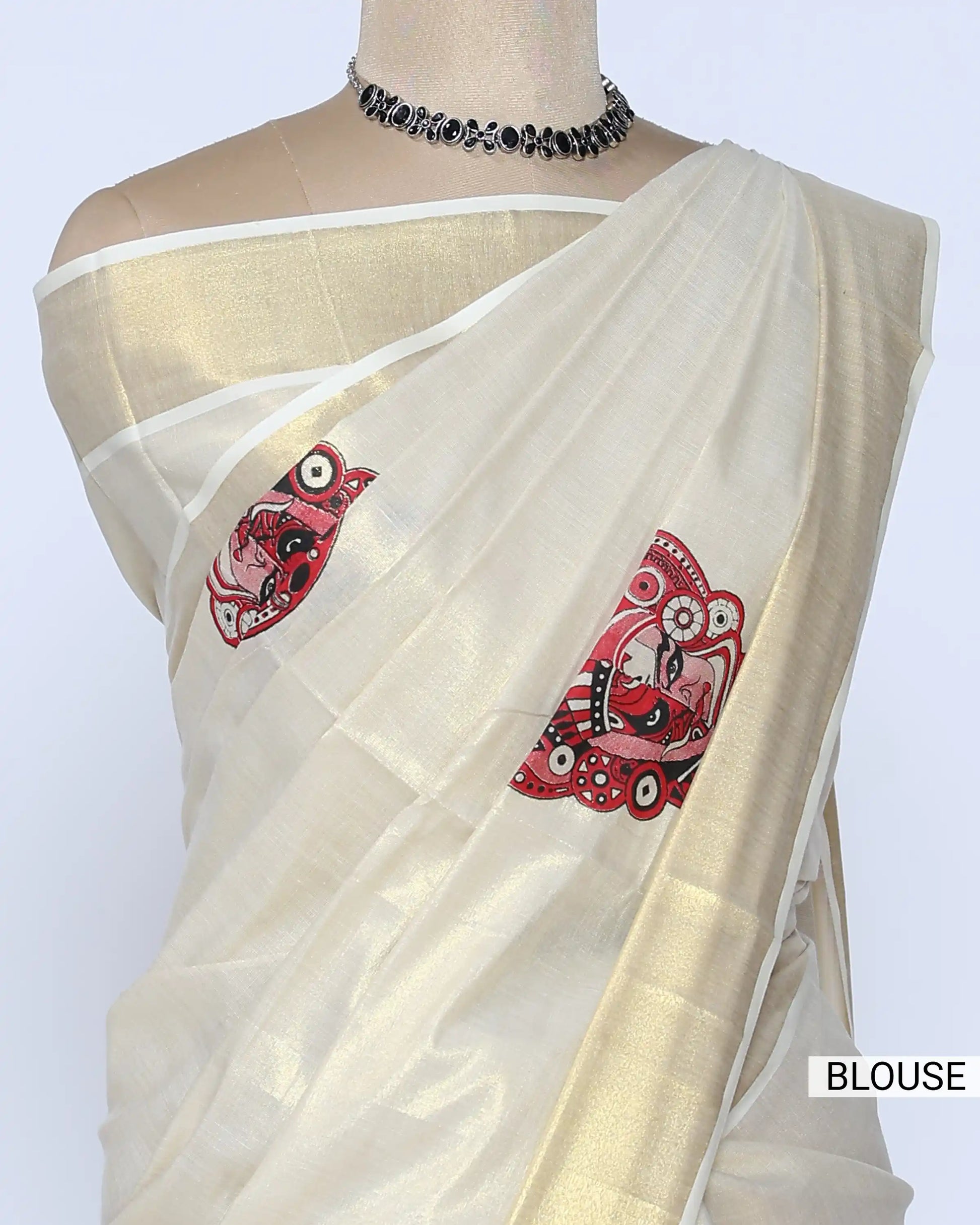 A cream-colored kerala saree with red print blouse view