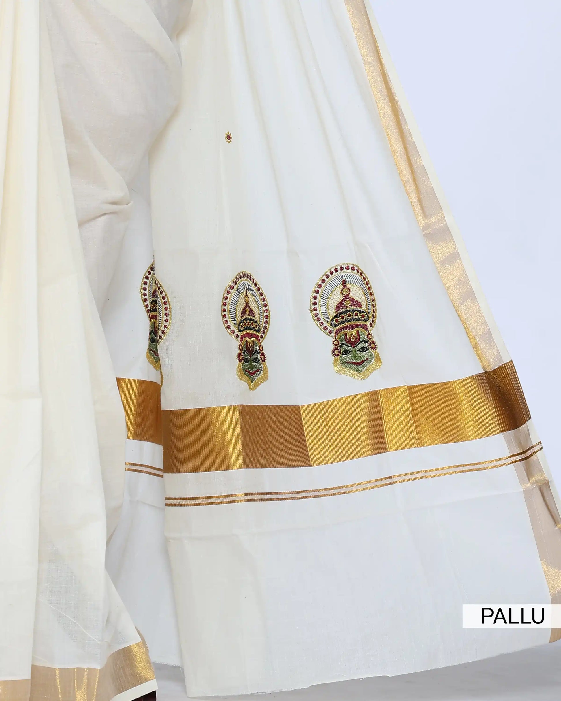 An off-white cotton saree with gold zari borders and small gold dots pallu view