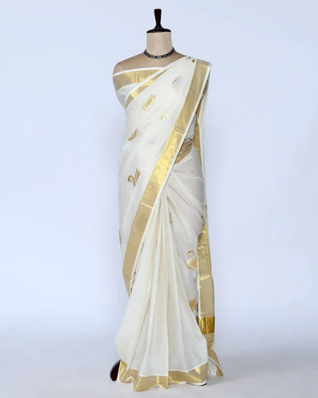 An off-white kerala saree with gold zari embroidery and borders - full view