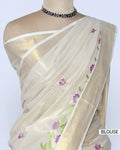 A cream-colored Kerala saree with purple and green floral embroidery Blouse view
