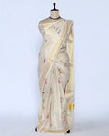 A cream-colored kerala saree with delicate floral prints and a gold border - full view