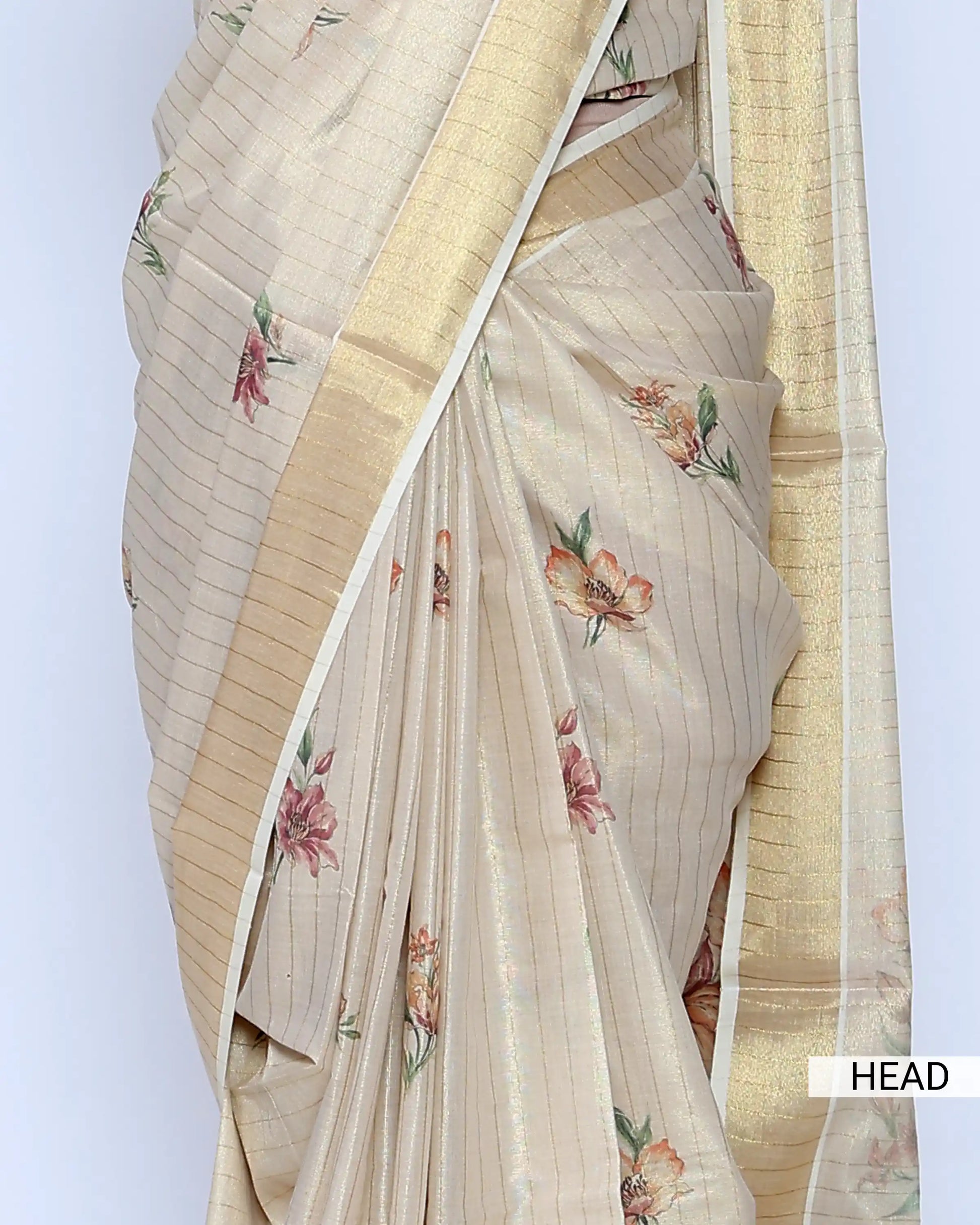 A cream-colored kerala saree with delicate floral prints and a gold border - head view