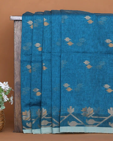 Peacock Blue Khadi Cotton Saree with Dual Tone Floral Butta Motifs and Traditional Floral Woven Border