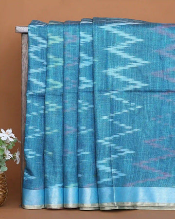 Sky Blue Khadi Cotton Saree with White Ikat Inspired Zigzag Pattern and Shimmering Blue Woven Border