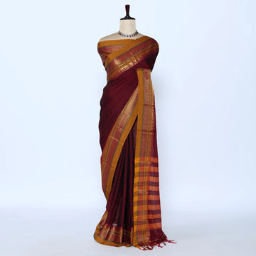 Narayanpet Cotton saree with deep maroon body and gold zari woven border, front drape view
