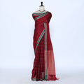 Deep red saree featuring green and gold woven striped border full view