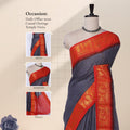 Grey Sungudi cotton saree with gold zari checks and red peacock motif border draped front view on mannequin