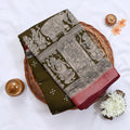 Semi Chanderi Saree featuring traditional temple art print and zari border in olive green - Close Up