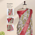 Semi Chanderi saree with cow motif print white and olive green body red woven border front view on mannequin