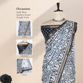 Semi Chanderi saree with floral vine print and broad zari woven border in black and white front view on mannequin