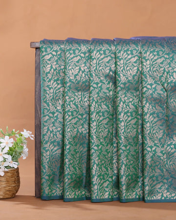 Semi Soft Silk Saree with Intricate Floral Vine Motifs and Traditional Woven Border - Green
