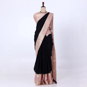 Mysore Silk saree with plain black body and silver with pink zari woven border, front drape view
