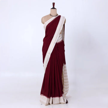 Mysore Silk saree with plain maroon body and off-white zari woven border, front drape view
