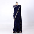 Mysore Silk saree with plain navy blue body and golden zari woven border, front drape view
