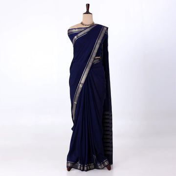 Mysore Silk saree with plain navy blue body and golden zari woven border, front drape view