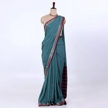 Mysore Silk saree with plain tealbody and silver with maroon  zari woven border, front drape view