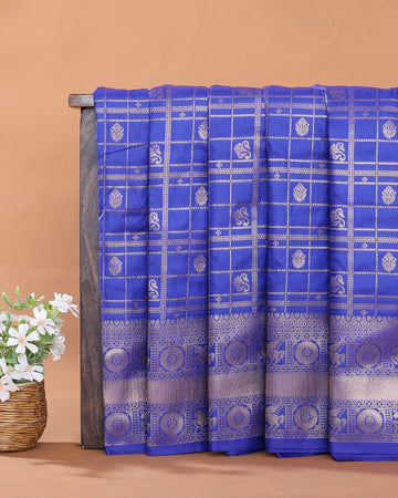 Semi Soft Silk Saree with Traditional Checked Pattern Intricate Woven Motifs and Elaborate Zari Border - Blue