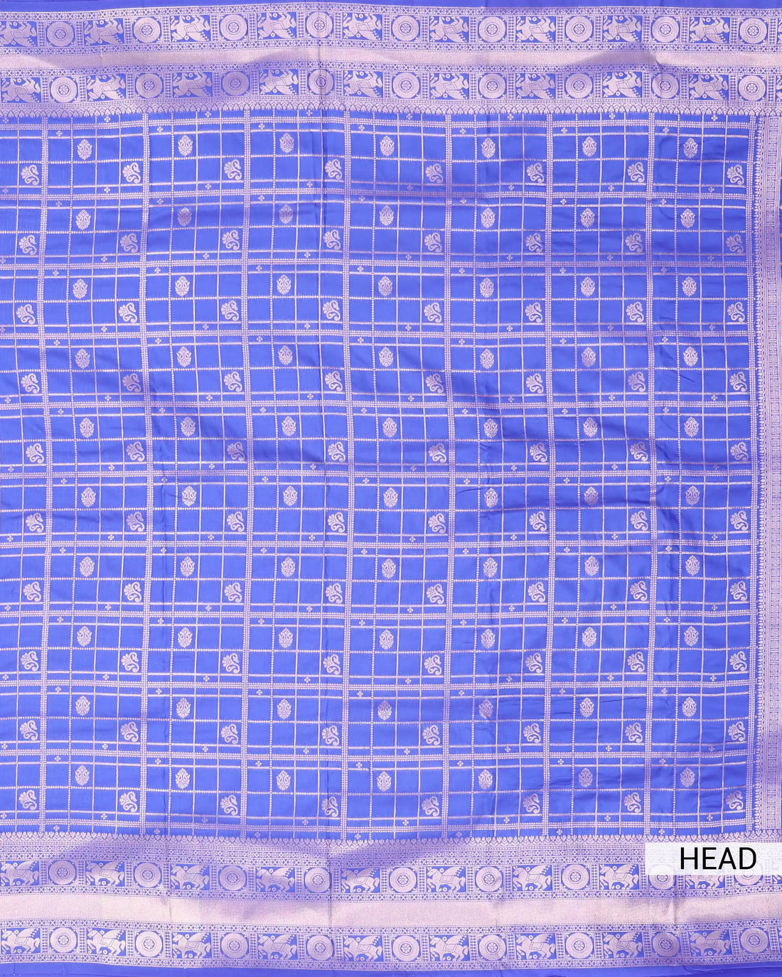 Semi Soft Silk Saree with Traditional Checked Pattern Intricate Woven Motifs and Elaborate Zari Border - Blue