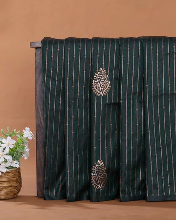 Semi Soft Silk Saree with Striped Zari Weave Intricate Leaf Motifs and Woven Border - Dark Green